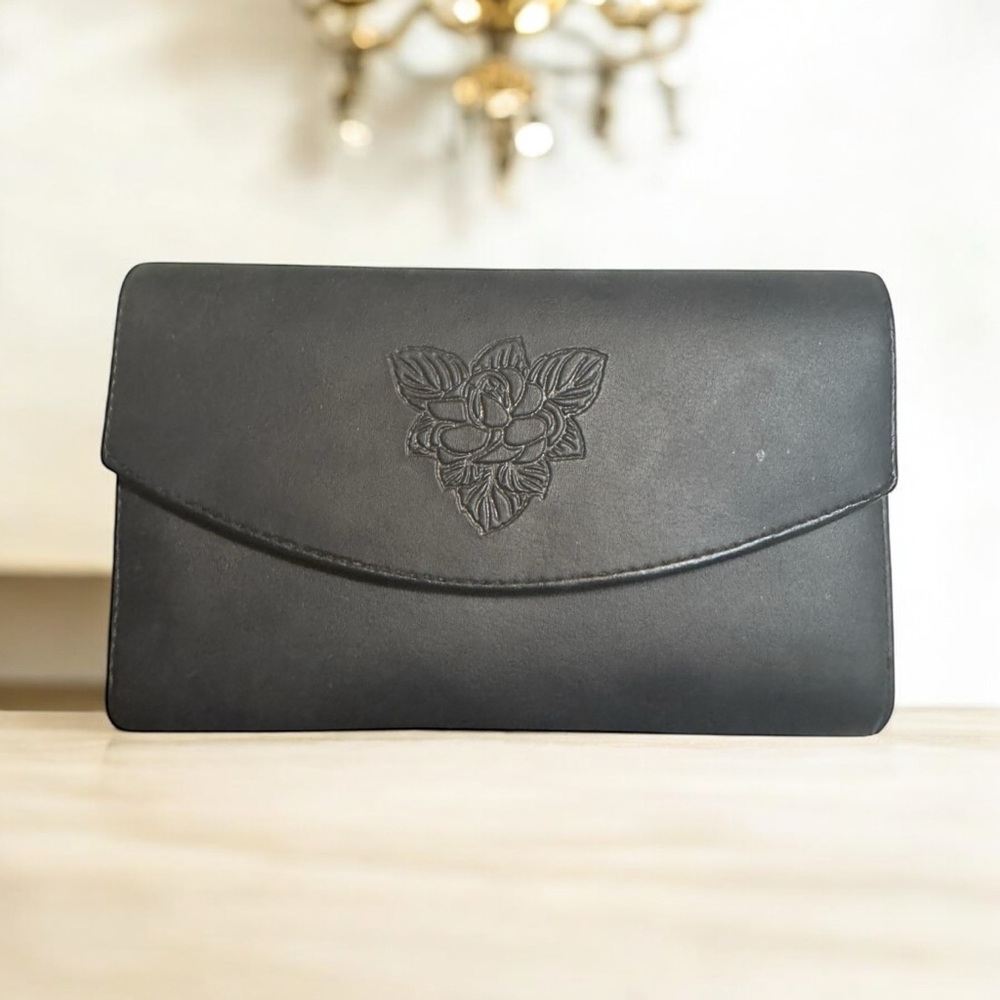 Elegant woman's black wallet